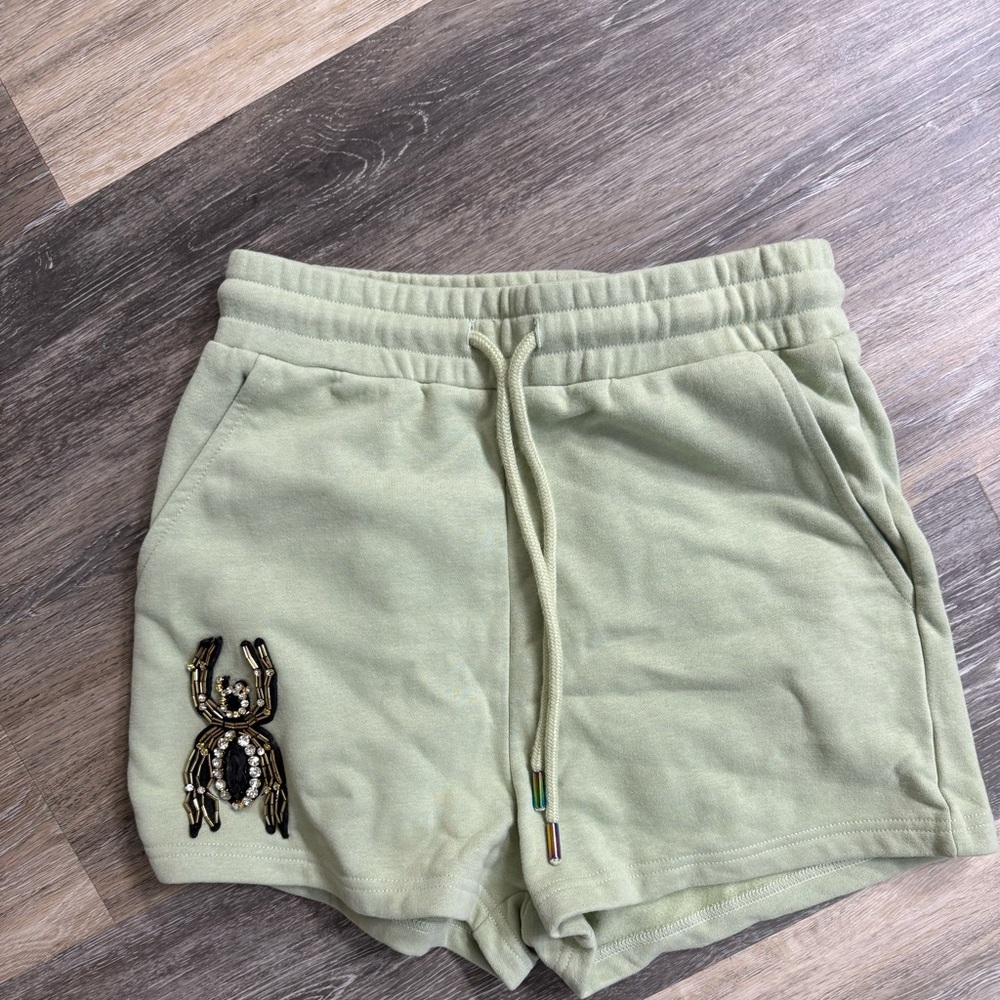 QUEEN OF SPARKLES Light Green Embroidered Athletic Shorts